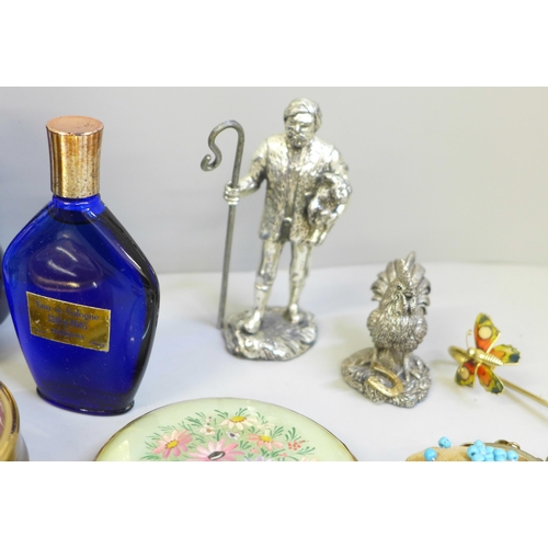 664 - A pair of silver rimmed vases, a silver filled model chicken, compacts and scent bottles