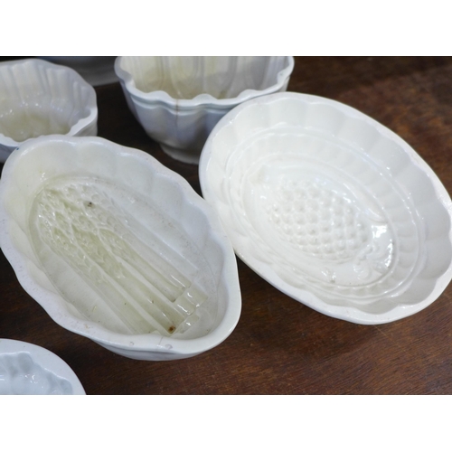 684 - Nine medium and small jelly moulds, one with hairline crack **PLEASE NOTE THIS LOT IS NOT ELIGIBLE F... 