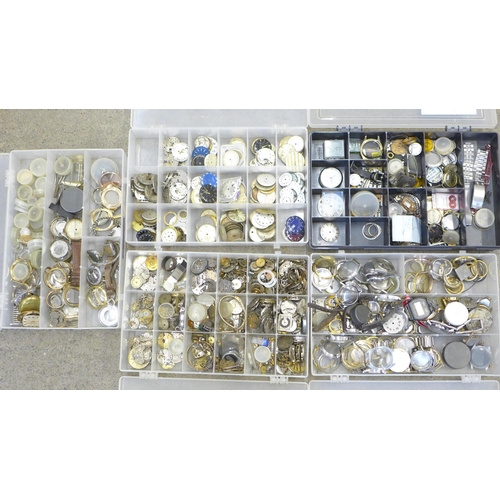 691 - Five tubs of mixed watch parts, cases, movements, dials, etc.