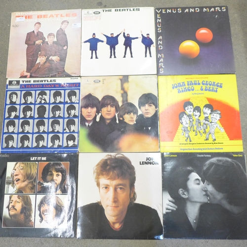 692 - Twelve The Beatles and solo LP records