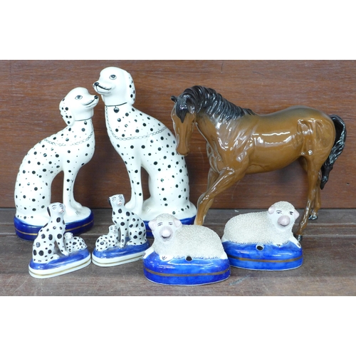 693 - A Royal Doulton figure of a horse and three pairs of Staffordshire figures; sheep, one ear a/f and d... 