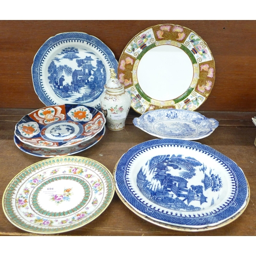 694 - Two Imari plates, a Noritake enamelled plate, a Samson Armorial lidded vase, an Ironstone plate, an ... 