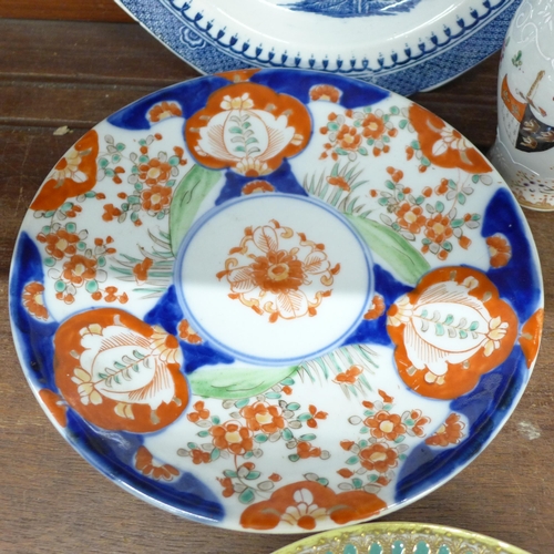 694 - Two Imari plates, a Noritake enamelled plate, a Samson Armorial lidded vase, an Ironstone plate, an ... 