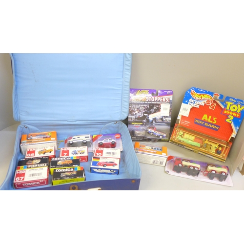 699 - A collection of model vehicles, all boxed including a Toy Story 2 Al's Toy Barn Hot Wheels set, 1999... 