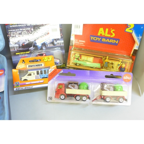 699 - A collection of model vehicles, all boxed including a Toy Story 2 Al's Toy Barn Hot Wheels set, 1999... 