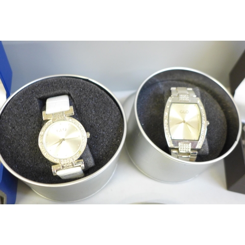 708 - Watches; two boxed Rotary gentleman's watches and two sets of GLO matching his and hers watches