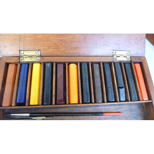 717 - Four late 19th/early 20th Century artist's wooden paint boxes including early Reeves & Sons