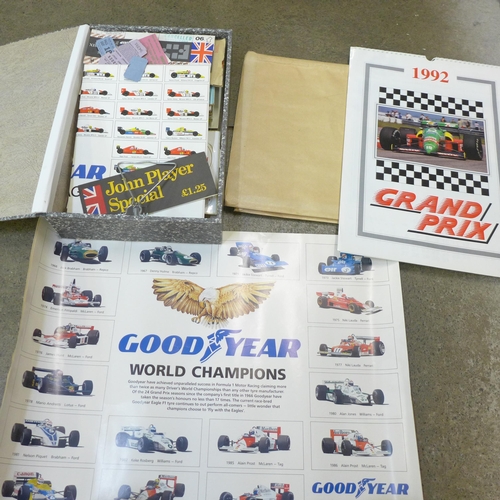 737 - A collection of Formula 1 memorabilia including stickers, race programmes, tickets, calendars, poste... 