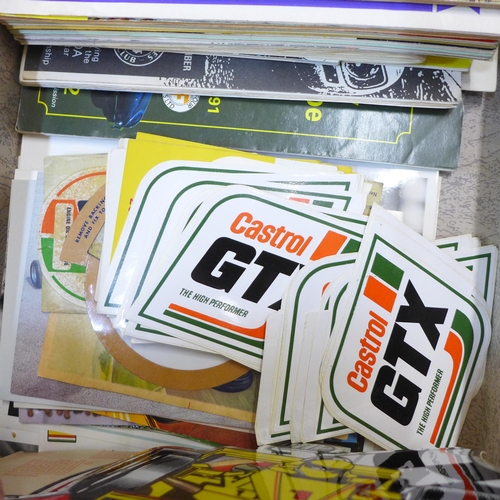 737 - A collection of Formula 1 memorabilia including stickers, race programmes, tickets, calendars, poste... 