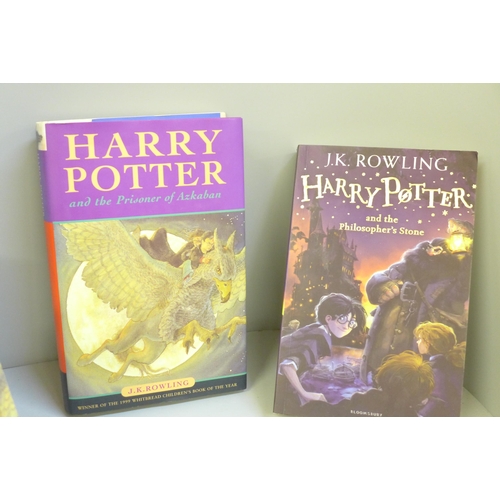 745 - A collection of Harry Potter hardback and paperback books including two first editions