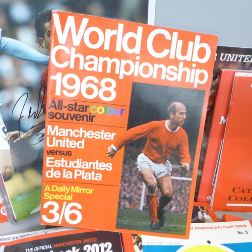 760 - Football memorabilia; a box of Manchester United ephemera including autographed photograph of Carlos... 