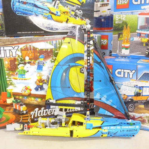 762 - Nine Lego sets; five City including 4 x 4 Response Unit and Heavy Cargo Transport, Technic Racing Ya... 