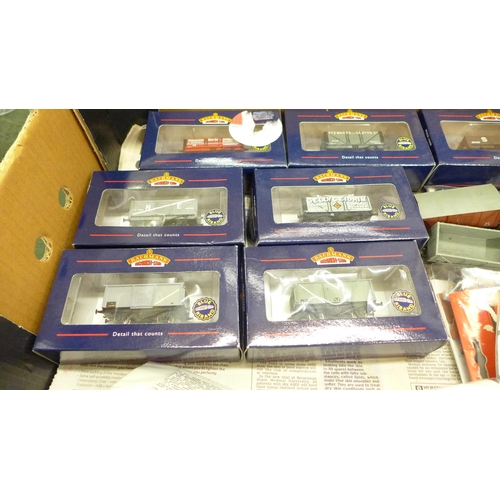 771 - A collection of model train parts, a.b.s models and other sealed sets and seven boxed Bachmann OO ga... 