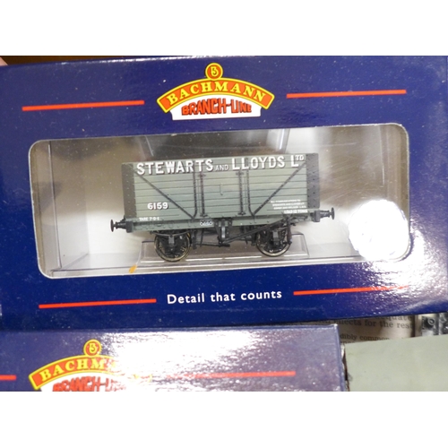 771 - A collection of model train parts, a.b.s models and other sealed sets and seven boxed Bachmann OO ga... 