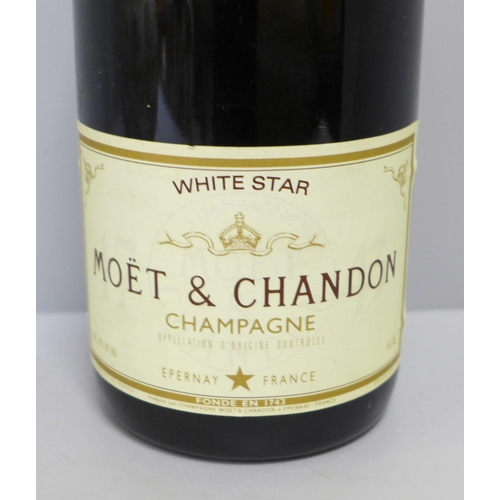 774 - A bottle of Moet and Chandon champagne, White Star label **PLEASE NOTE THIS LOT IS NOT ELIGIBLE FOR ... 