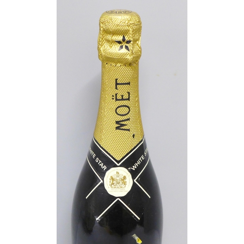 774 - A bottle of Moet and Chandon champagne, White Star label **PLEASE NOTE THIS LOT IS NOT ELIGIBLE FOR ... 