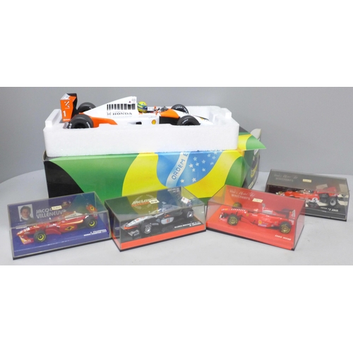 783 - An Ayrton Senna 1:18 scale F1 car, McLaren MP4/6 1991 World Champion and four other F1 cars, all box... 