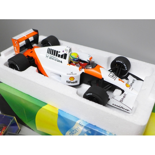 783 - An Ayrton Senna 1:18 scale F1 car, McLaren MP4/6 1991 World Champion and four other F1 cars, all box... 