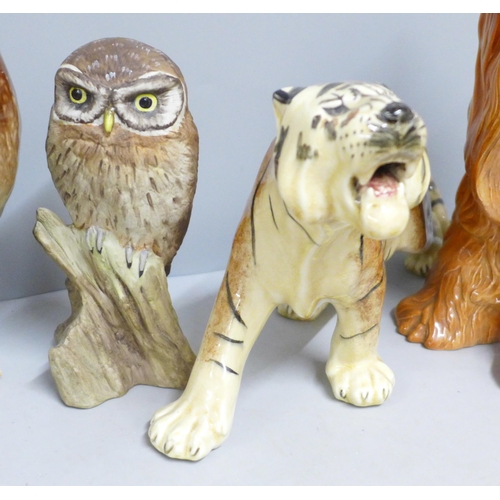 788 - A Beswick fireside Yorkie 2377, a/f, right ear chipped, a model of an owl, signed M. Booth for Acorn... 