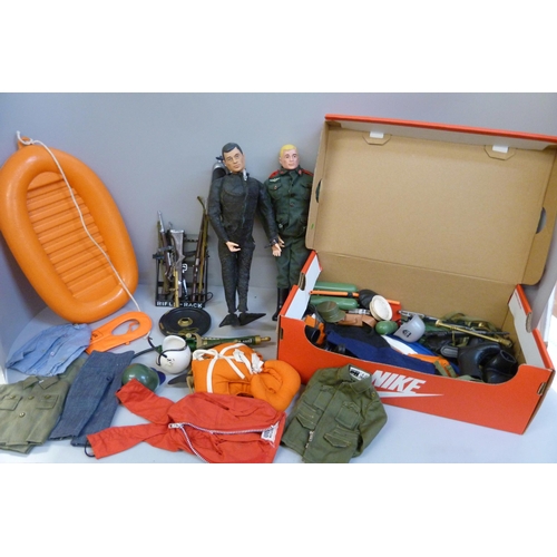 800 - Two vintage Action Man figures, dinghy and a collection of accessories