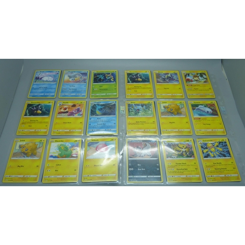 801 - Over 300 Pokemon cards in protective sleeves