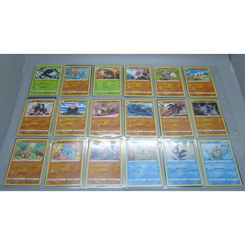 801 - Over 300 Pokemon cards in protective sleeves