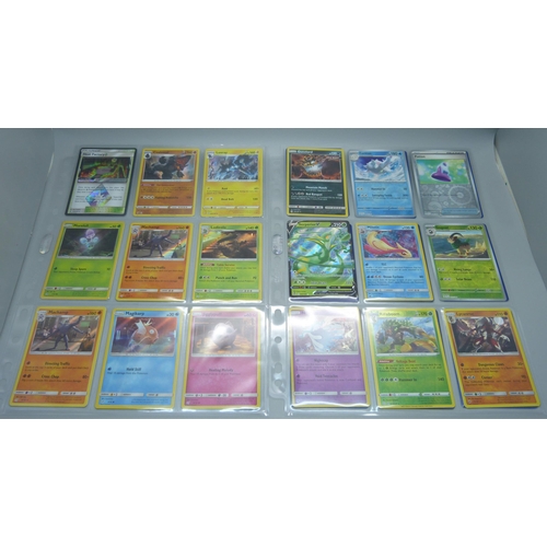 804 - 99 Holographic Pokemon cards from different sets, all in protective sleeves