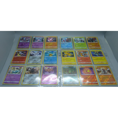 804 - 99 Holographic Pokemon cards from different sets, all in protective sleeves