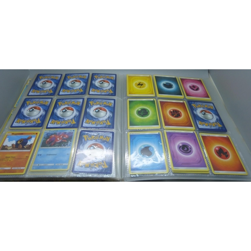 808 - A Pokemon folder with over 400 cards including holographic