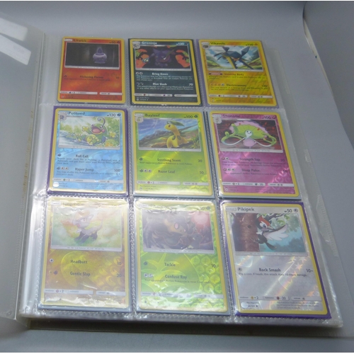 809 - A Pokemon card folder with 396 cards including holographic