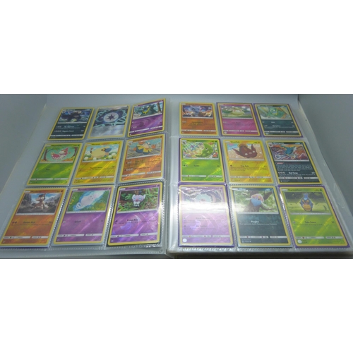 809 - A Pokemon card folder with 396 cards including holographic