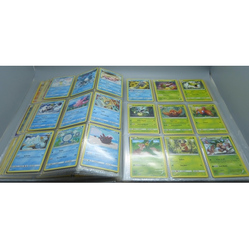 809 - A Pokemon card folder with 396 cards including holographic