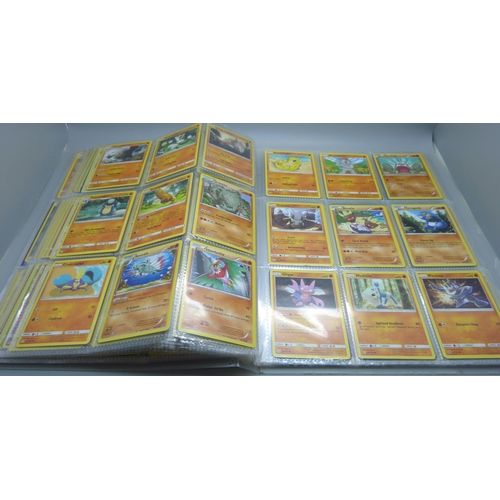 809 - A Pokemon card folder with 396 cards including holographic