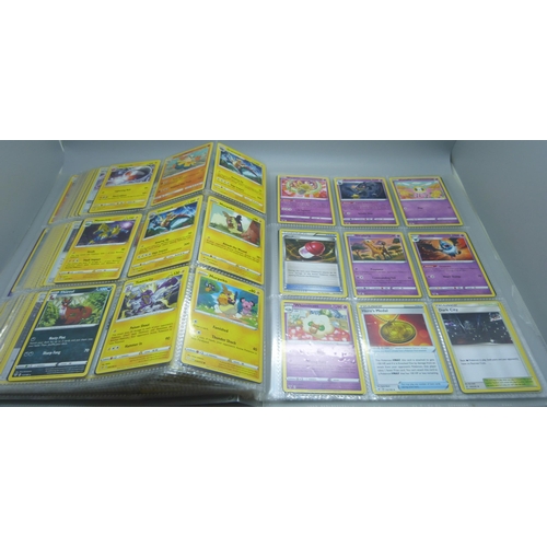 809 - A Pokemon card folder with 396 cards including holographic