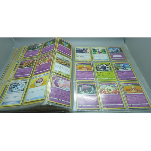 809 - A Pokemon card folder with 396 cards including holographic