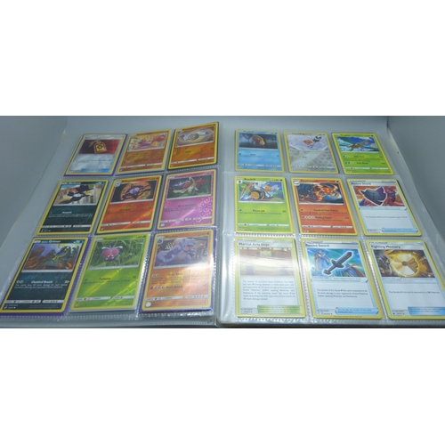 809 - A Pokemon card folder with 396 cards including holographic