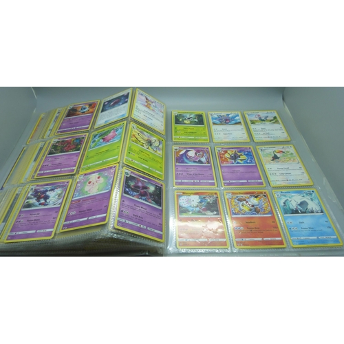 809 - A Pokemon card folder with 396 cards including holographic