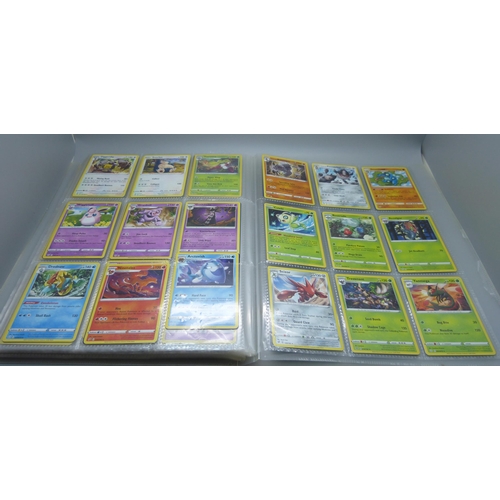 809 - A Pokemon card folder with 396 cards including holographic