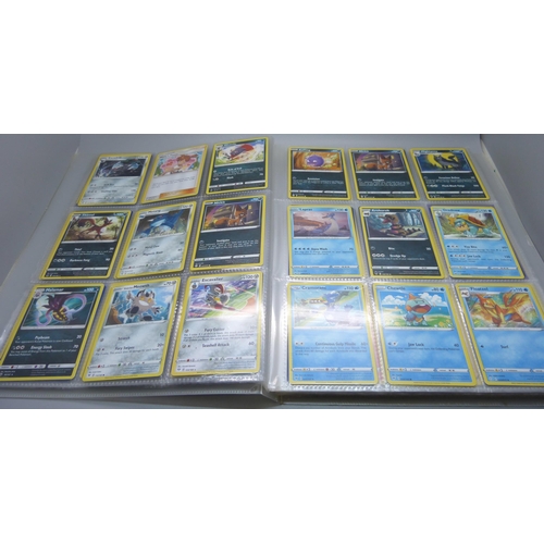 809 - A Pokemon card folder with 396 cards including holographic