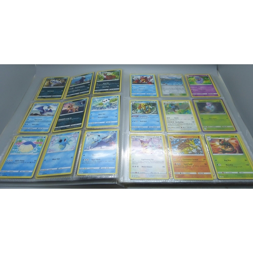 809 - A Pokemon card folder with 396 cards including holographic