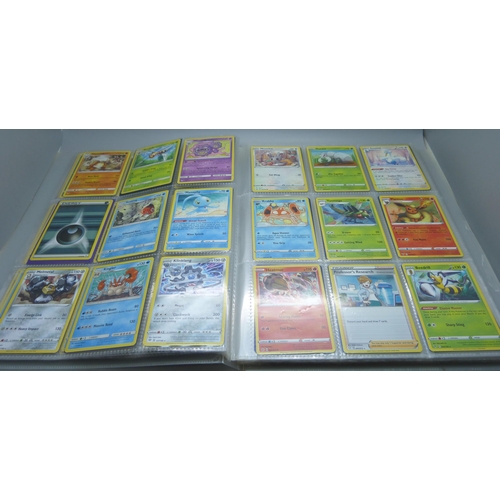 809 - A Pokemon card folder with 396 cards including holographic