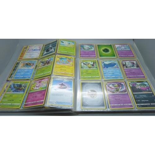 809 - A Pokemon card folder with 396 cards including holographic