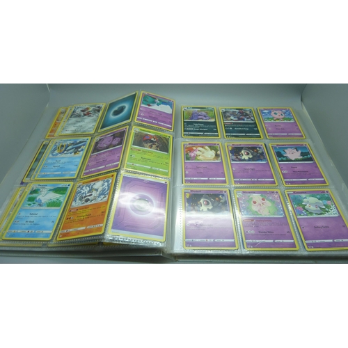 809 - A Pokemon card folder with 396 cards including holographic