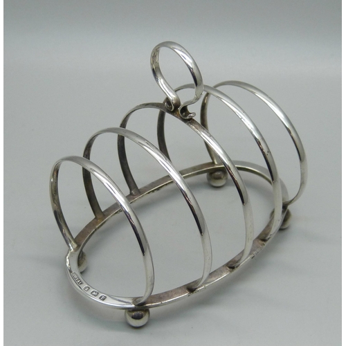 819 - A silver toast rack, Birmingham 1930, G Unite & Sons & Lyde Ltd., 54g