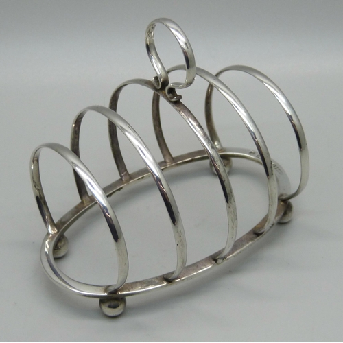 819 - A silver toast rack, Birmingham 1930, G Unite & Sons & Lyde Ltd., 54g