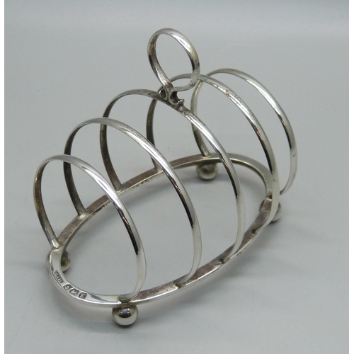 819 - A silver toast rack, Birmingham 1930, G Unite & Sons & Lyde Ltd., 54g