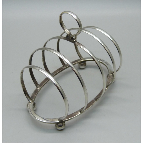 819 - A silver toast rack, Birmingham 1930, G Unite & Sons & Lyde Ltd., 54g