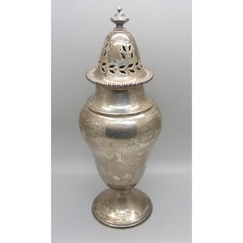 824 - A large silver shaker, with inscription dated 1945, 280g, 21cm