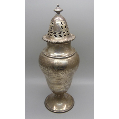 824 - A large silver shaker, with inscription dated 1945, 280g, 21cm