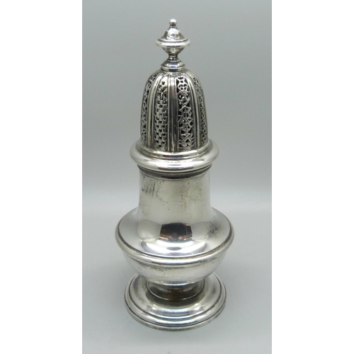 831 - A Georgian style silver castor, London 1957, William Comyns & Sons Ltd., (R.C), 235g